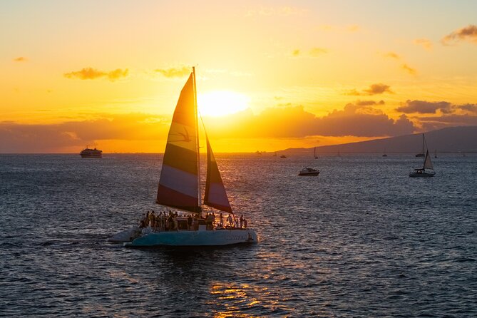 Board from Waikiki Beach for a scenic Sunset Sail on the Hāwea - How the sail feels: motion, music, and photo chances
