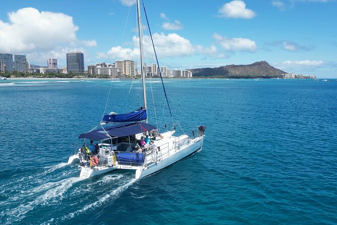 BYOB Waikiki Sunset Swim and Diamond Head Sailing - Swim and Snorkeling in Waikiki’s Clear Water: What’s Included and What to Watch