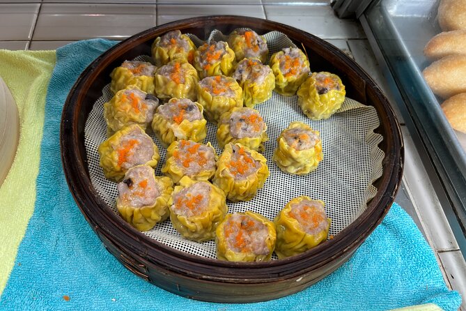 Hawaii Off The Beaten Path Food Tour - Chinatown tasting run: turon, chicken adobo, roast meats, and more