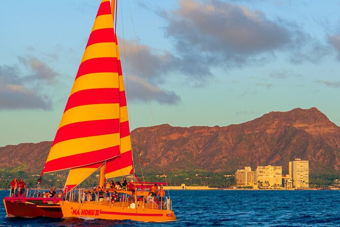 Honolulu Sunset Sail from Kewalo Harbor Including Drinks - Na Hoku II catamaran experience: deck vibe, seating, and photos