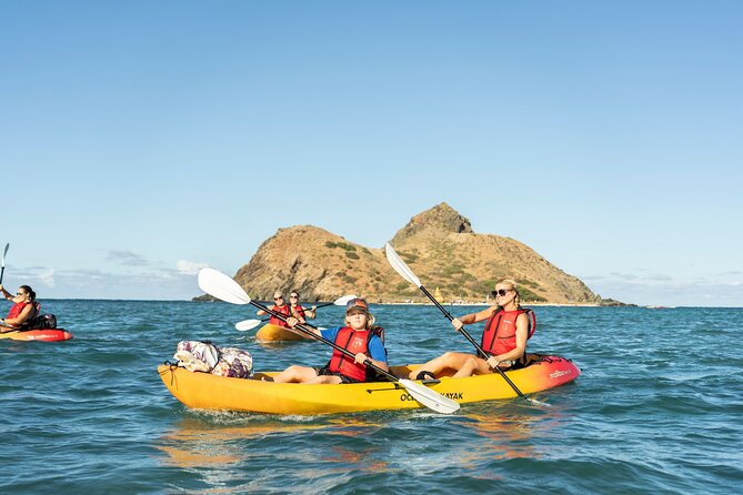 Mokulua Islands Self-Guided Kayak Adventure - Paddling toward Mokulua: reef protection and turtle habitat