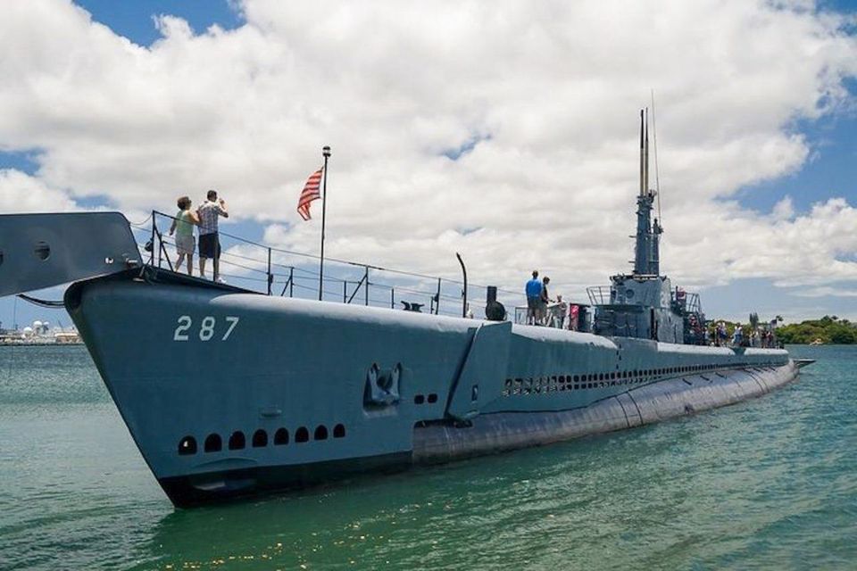 Oahu: Pearl Harbor, USS Arizona, and City Tour - Hawaii State Capitol grounds: memorials, the Eternal Flame, and Kamehameha at full scale