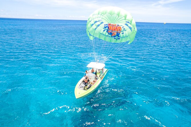 Parasailing on Maunalua Bay- Oahu's off Waikiki Playground - The Boat Cruise Between Turns: Relax While Others Fly