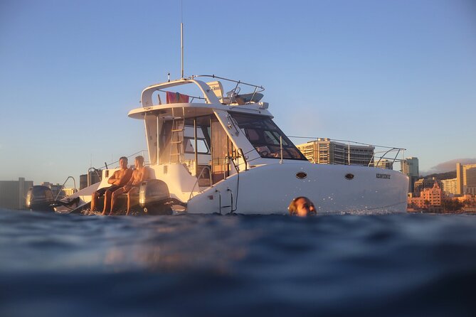 Private Catamaran Cruise and Snorkeling Tour in Honolulu - Getting on board: meeting point, timing, and group size